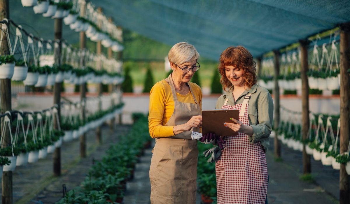 two women looking at tablet together